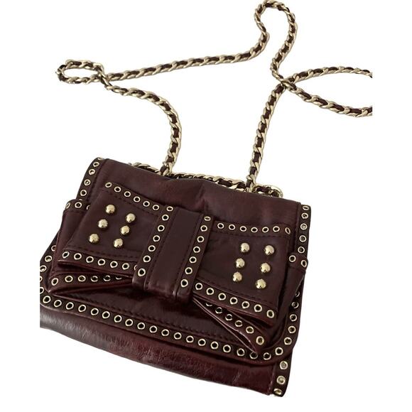 Rebecca Minkoff Handbags - Rebecca Minkoff Sweetie Bow Crossbody Bag Leather Detailed with Grommets Studs